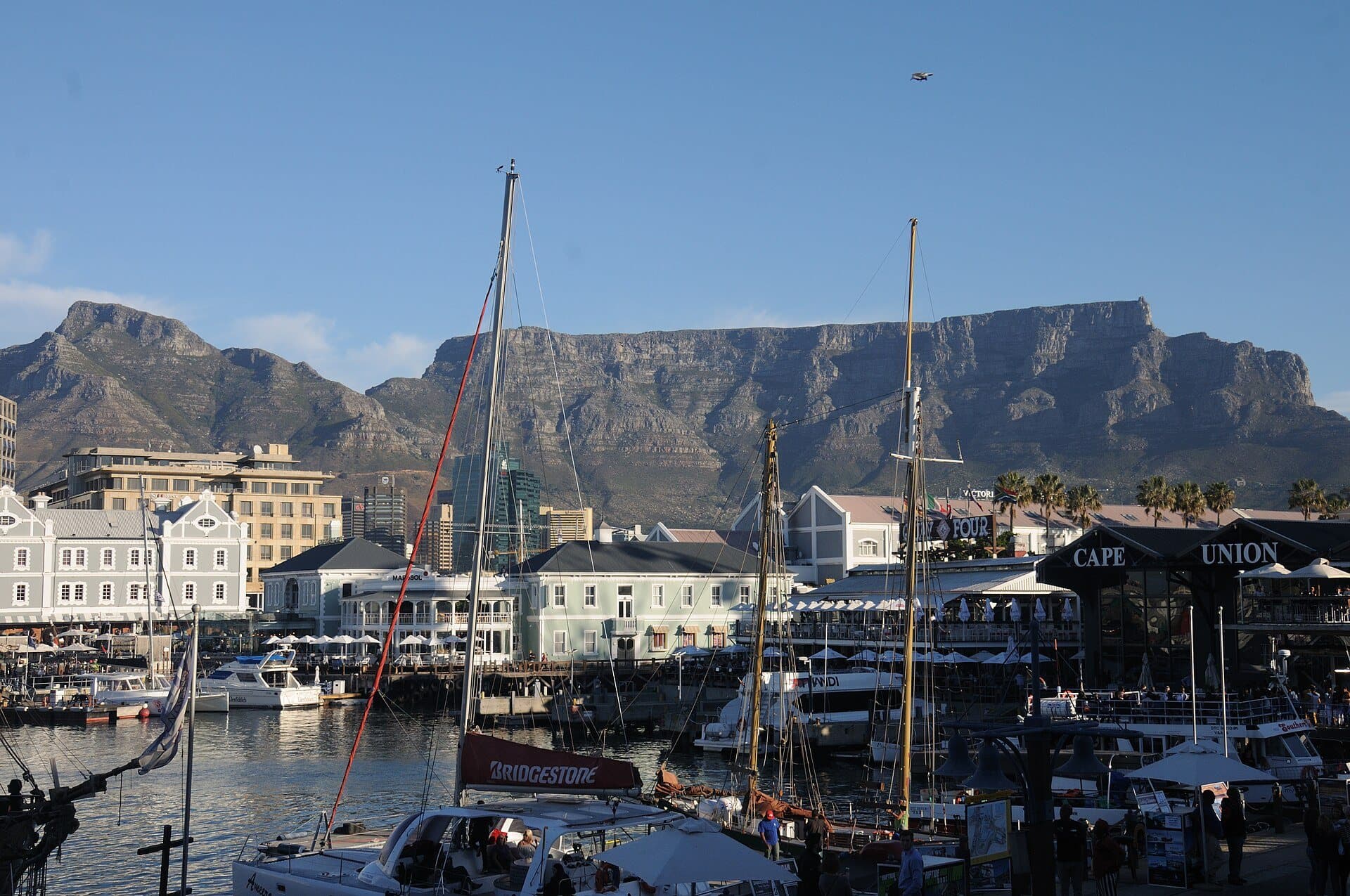 Boats moored at the V&A Waterfront, with Table Mountain behind